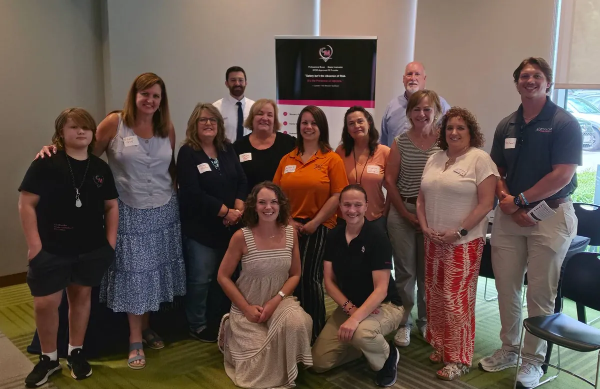 Attendees and organisers together at the close of a Momba organizational safety session